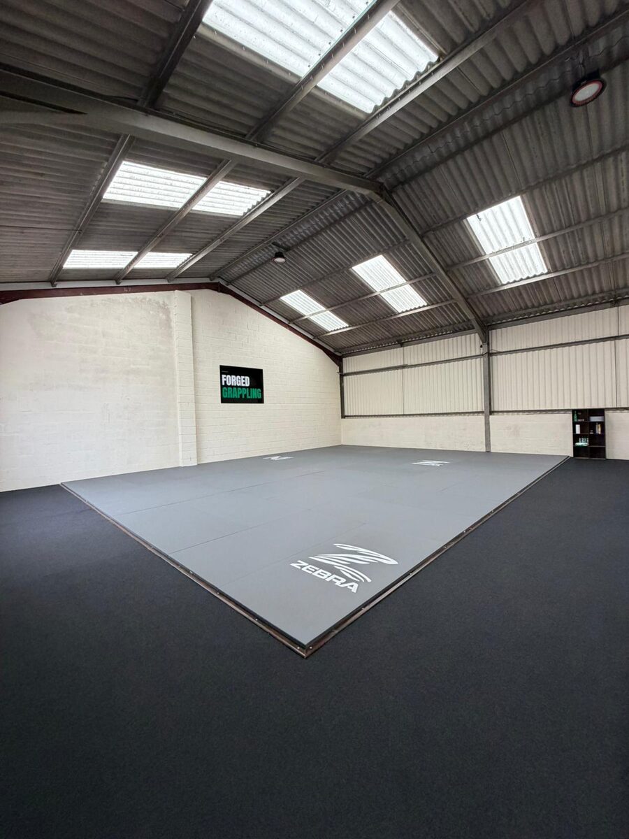 Competition-grade grappling mats at Forged Grappling gym in Westbury, Wiltshire