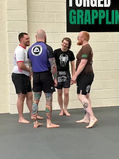 Members chatting after training at Forged Grappling